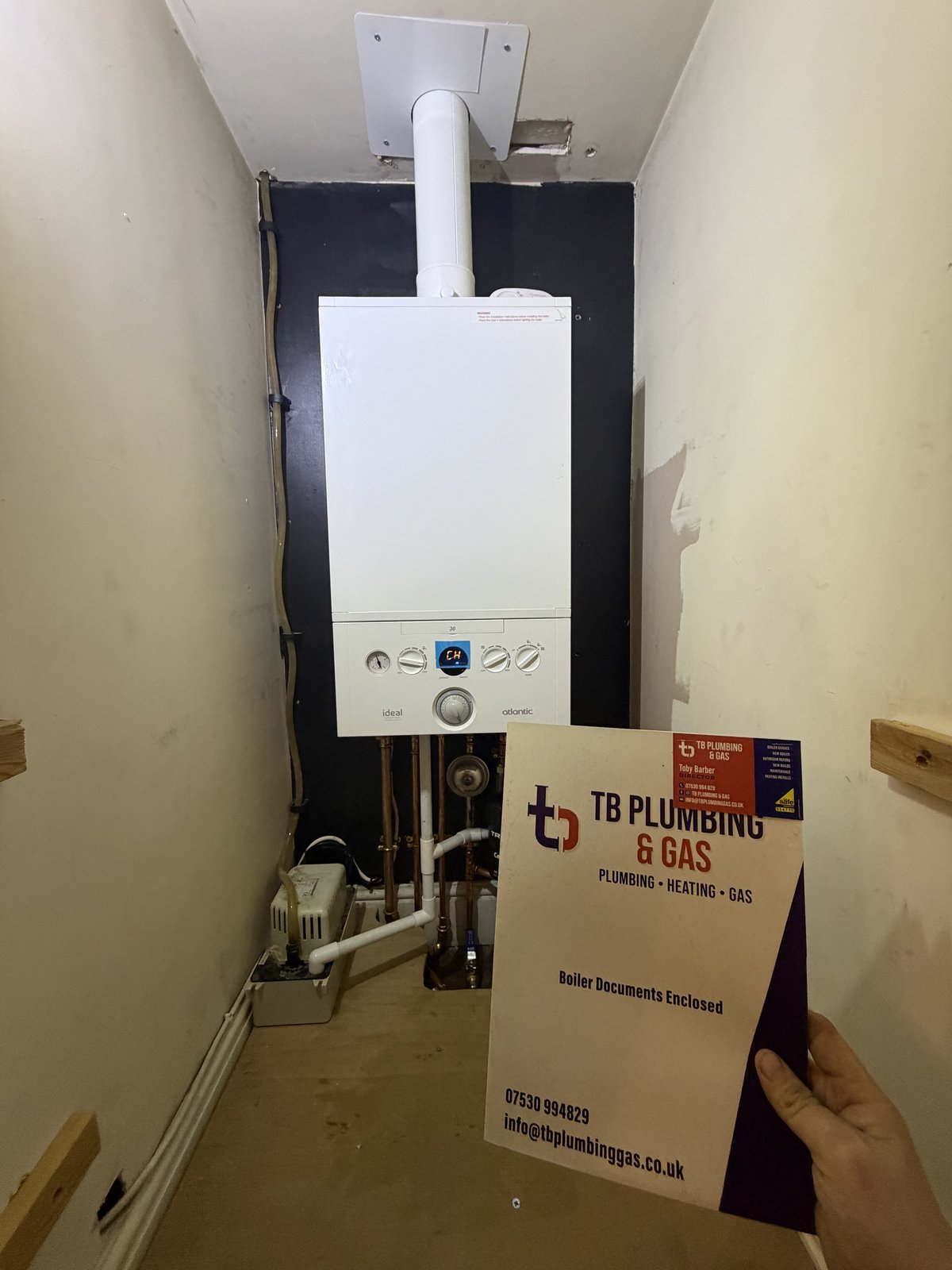 Boiler installed and re-piped neatly, with all documentation handed over on completion.